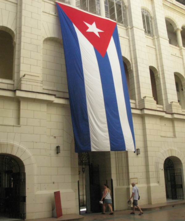 A massive flag hangs in Havana’s Museo de la Revolución. 