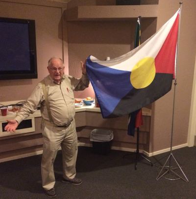 David Ferriday with his Flag for All Mankind in the 21st Century.